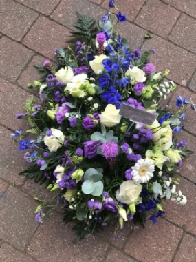 Purple and White Casket Spray